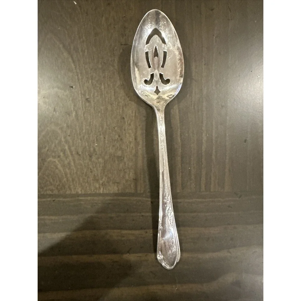 Wm A Rogers Company A1 Plus Oneida Slotted Serving Spoon‎